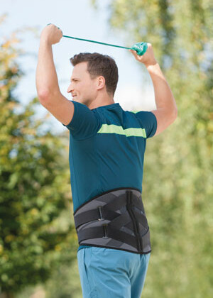 Man exercising with orthosis 